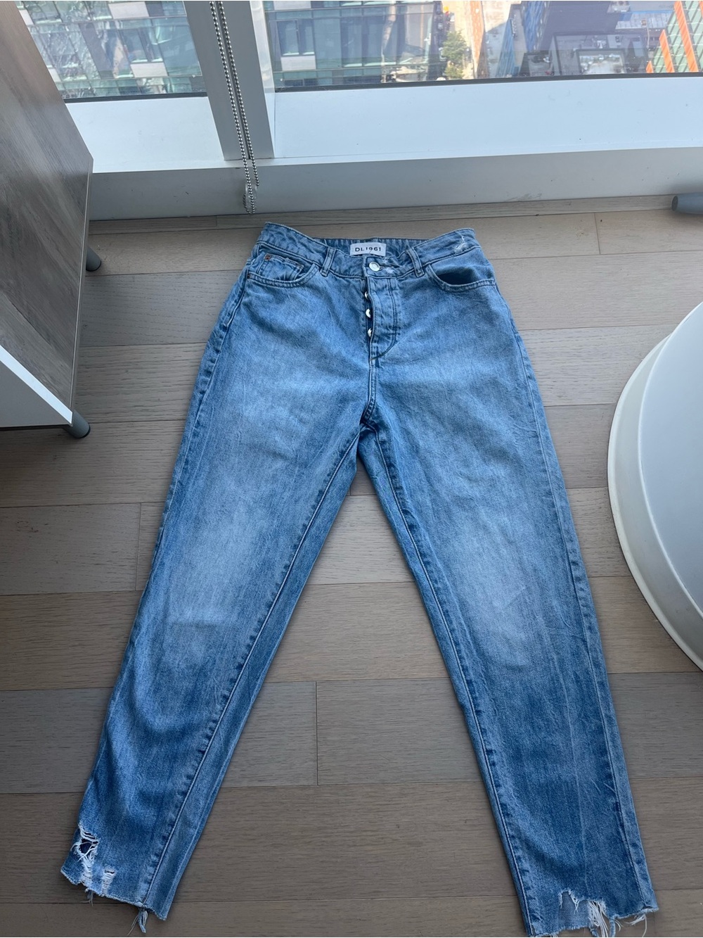 DL1961 Light Blue Boyfriend Jeans with Distressed Hem